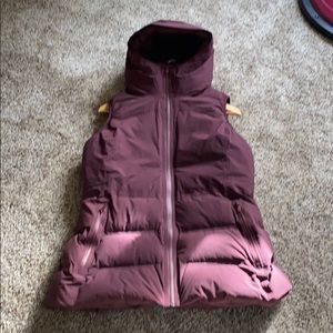 Lululemon puffy long vest maroon in color